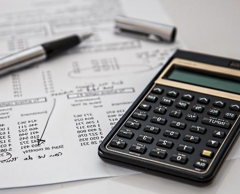 calculator and receipts - tax preparation